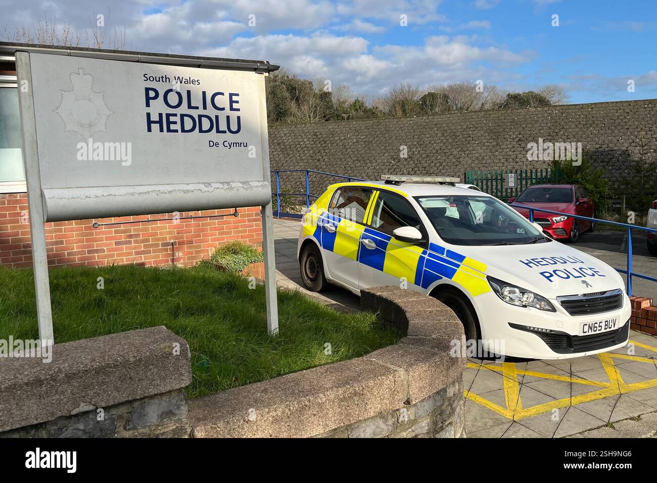 A Police Car parked outside Mumbles Police Station. Swansea, Wales, United Kingdom. - Smartphone Captured Stock Image