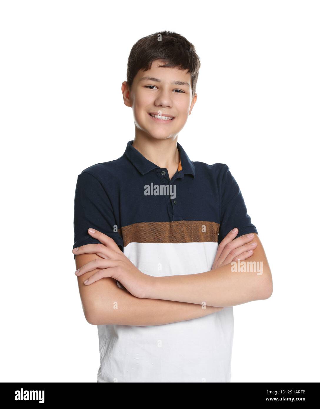 Portrait of teenage boy with crossed arms on white background Stock ...