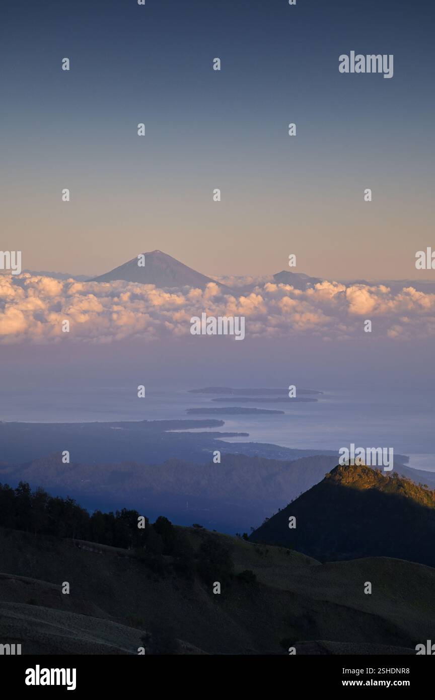 Gunung Agung in Bali and the Gili islands at sunrise, from Mount Rinjani in Lombok, Indonesia Stock Photo