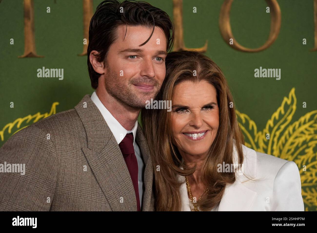 Patrick Schwarzenegger, left, and Maria Shriver arrive at the season