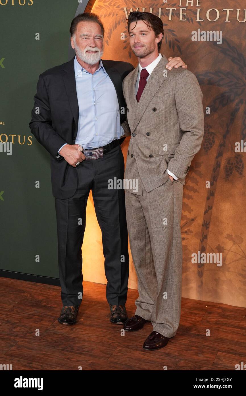 Arnold Schwarzenegger, left, and Patrick Schwarzenegger arrive at the