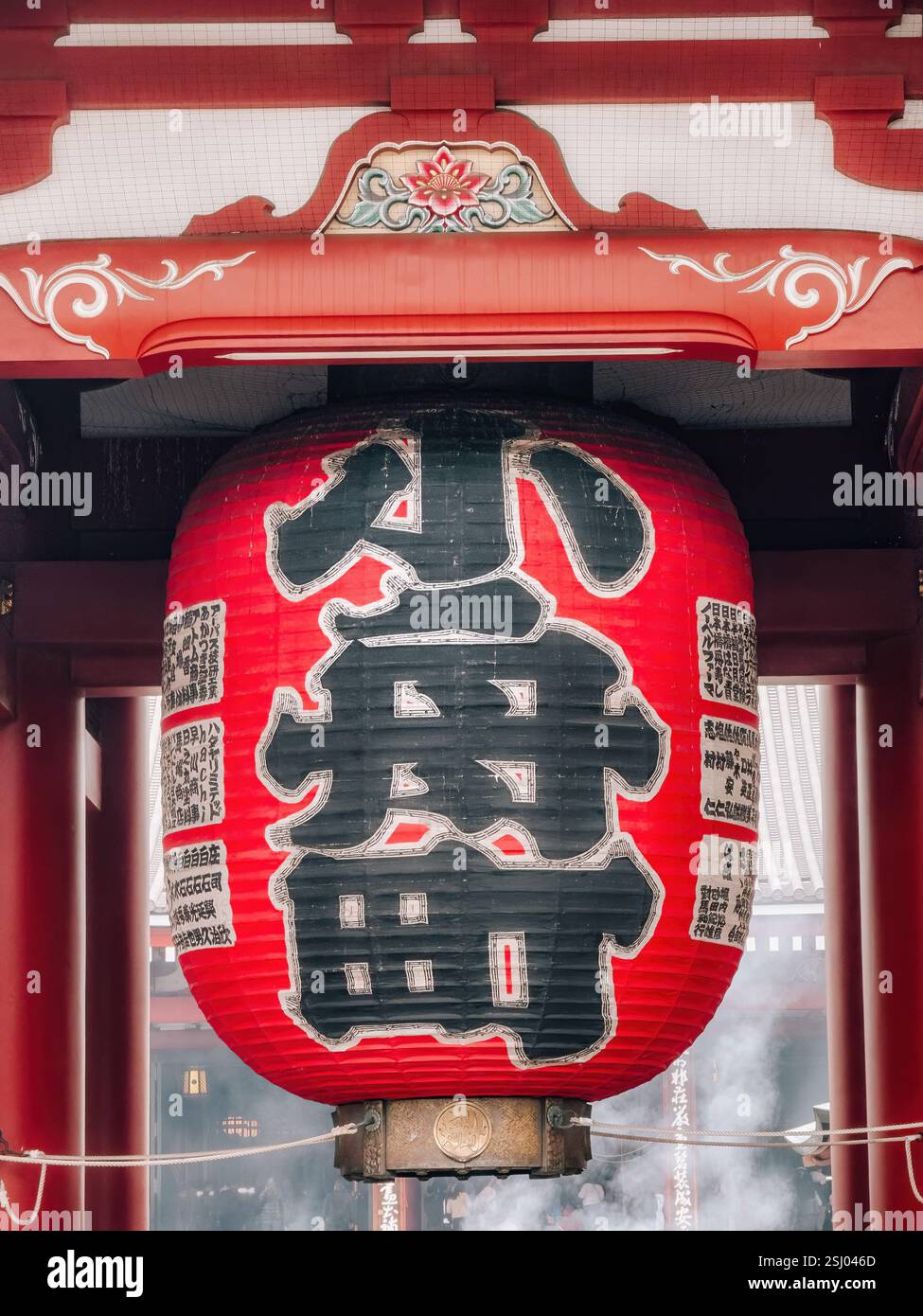 Senso-ji, Asakusa Kannon ancient Buddhist temple in Asakusa, Tokyo, Japan. Large lantern, red chochin at Hozomon, Treasure-House Gate. - Smartphone Captured Stock Image