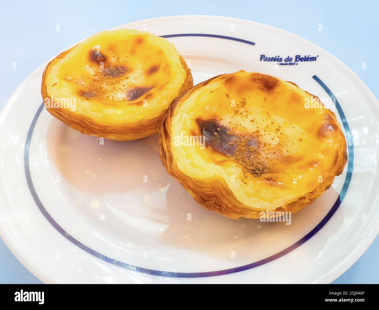 Pastéis de nata, Pastel de nata. Portuguese egg custard tart pastry served at Pastéis de Belém in Belém, Lisbon, Portugal. - Smartphone Captured Stock Image
