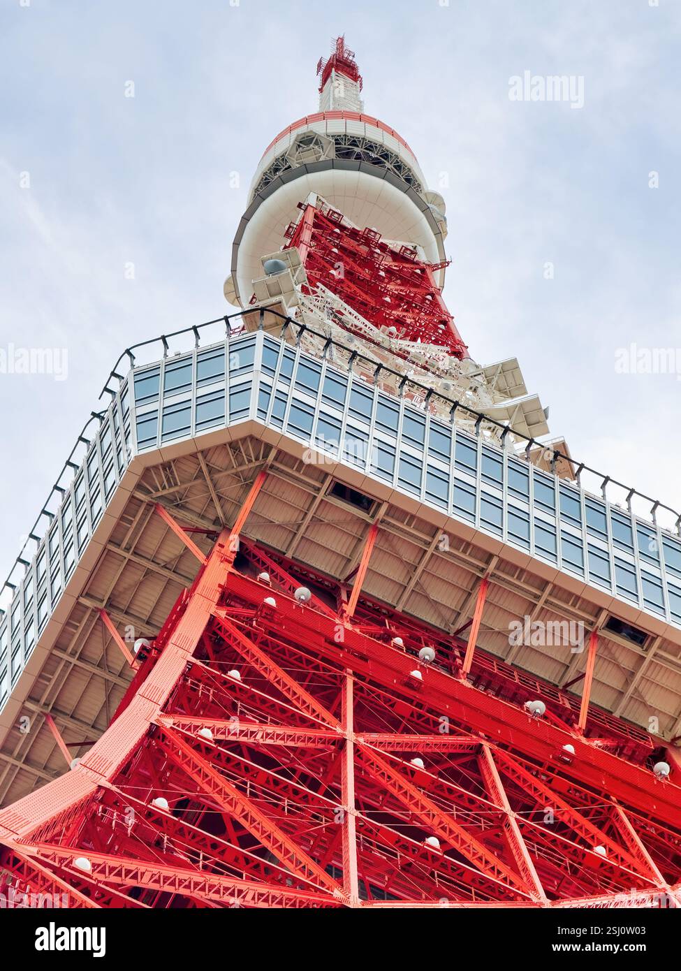 Tokyo Tower in Tokyo, Japan. Red orange Eiffel Tower-inspired lattice tower, major landmark in Tokyo. - Smartphone Captured Stock Image