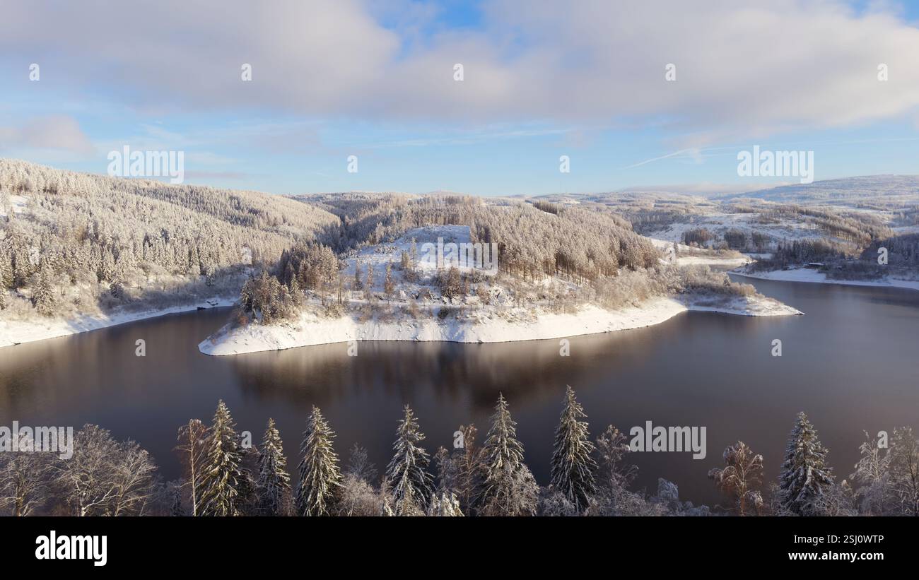 Sunny day in winter in the snowy Harz mountains, Germany. Okertalsperre, Oker Dam. Reservoir in Lower Saxony, Germany. - Smartphone Captured Stock Image
