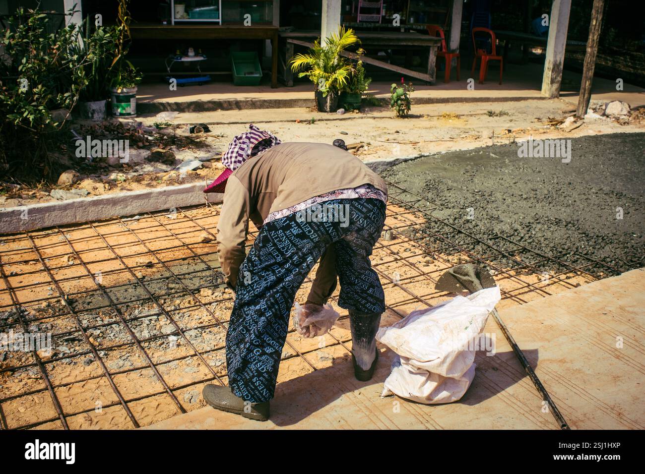 Local Roads Making Preak Svay, Koh Rong Island, Cambodia, February 6, 2025 Local people ...