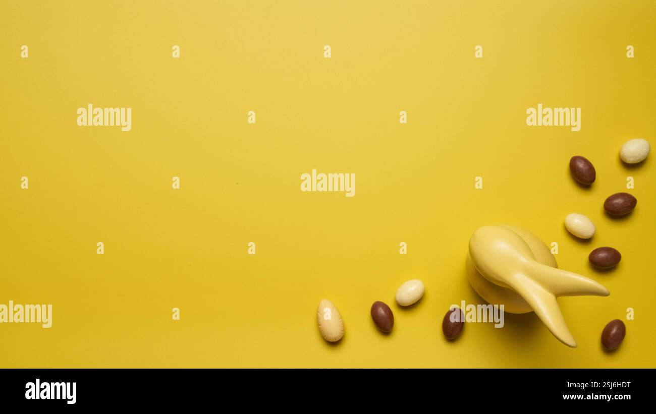 Delicious Easter holiday chocolate bunny, eggs and sweets Stock Photo