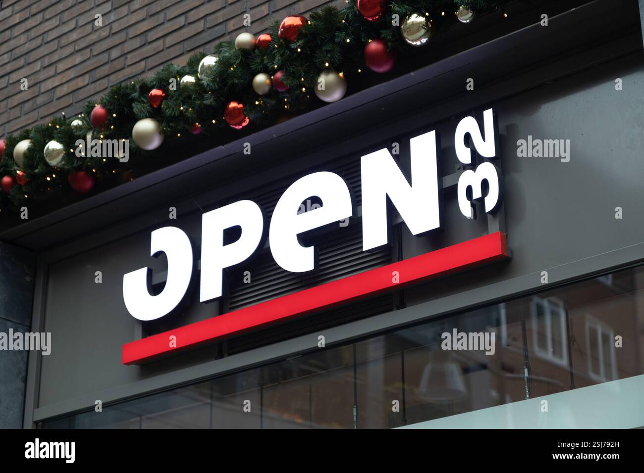 Open32 Open32 fashion store logo above the entrance, Utrecht, the Netherlands ...
