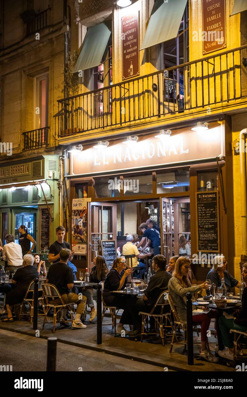 Busy cafes and bars in the evening along Rue Rode, Bordeaux, Nouvelle-Aquitaine, France, Europe Stock Photo