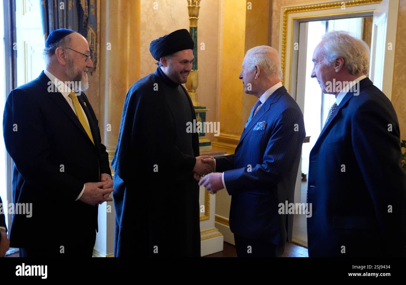 King Charles III is introduced to Chief Imam Dr Sayed Razawi (2nd left ...