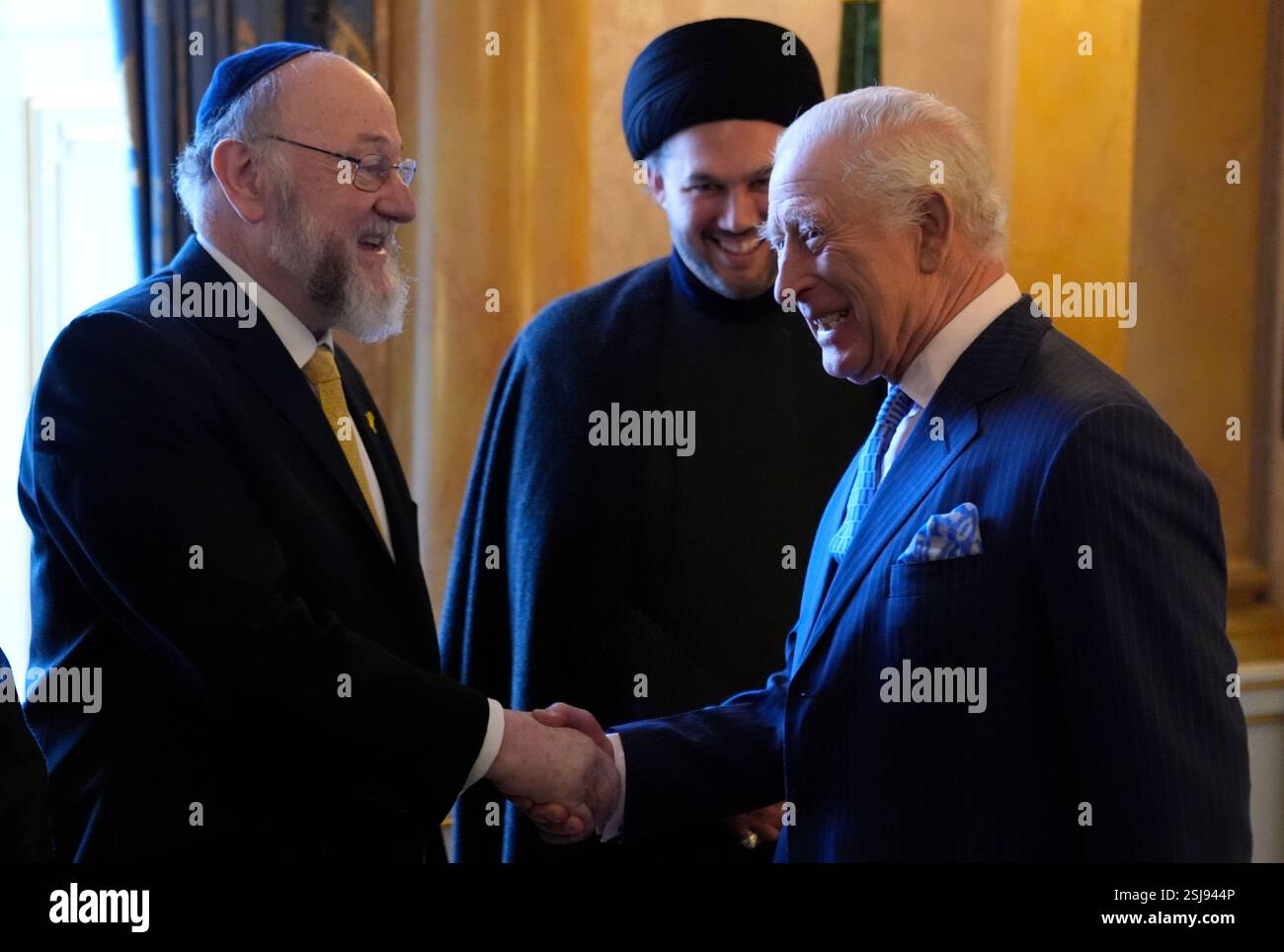 King Charles III (right) meets with Chief Imam Dr Sayed Razawi and ...