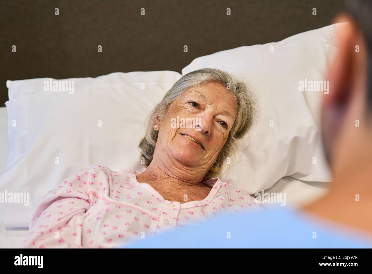 Elderly woman in hospital bed hi-res stock photography and images - Alamy