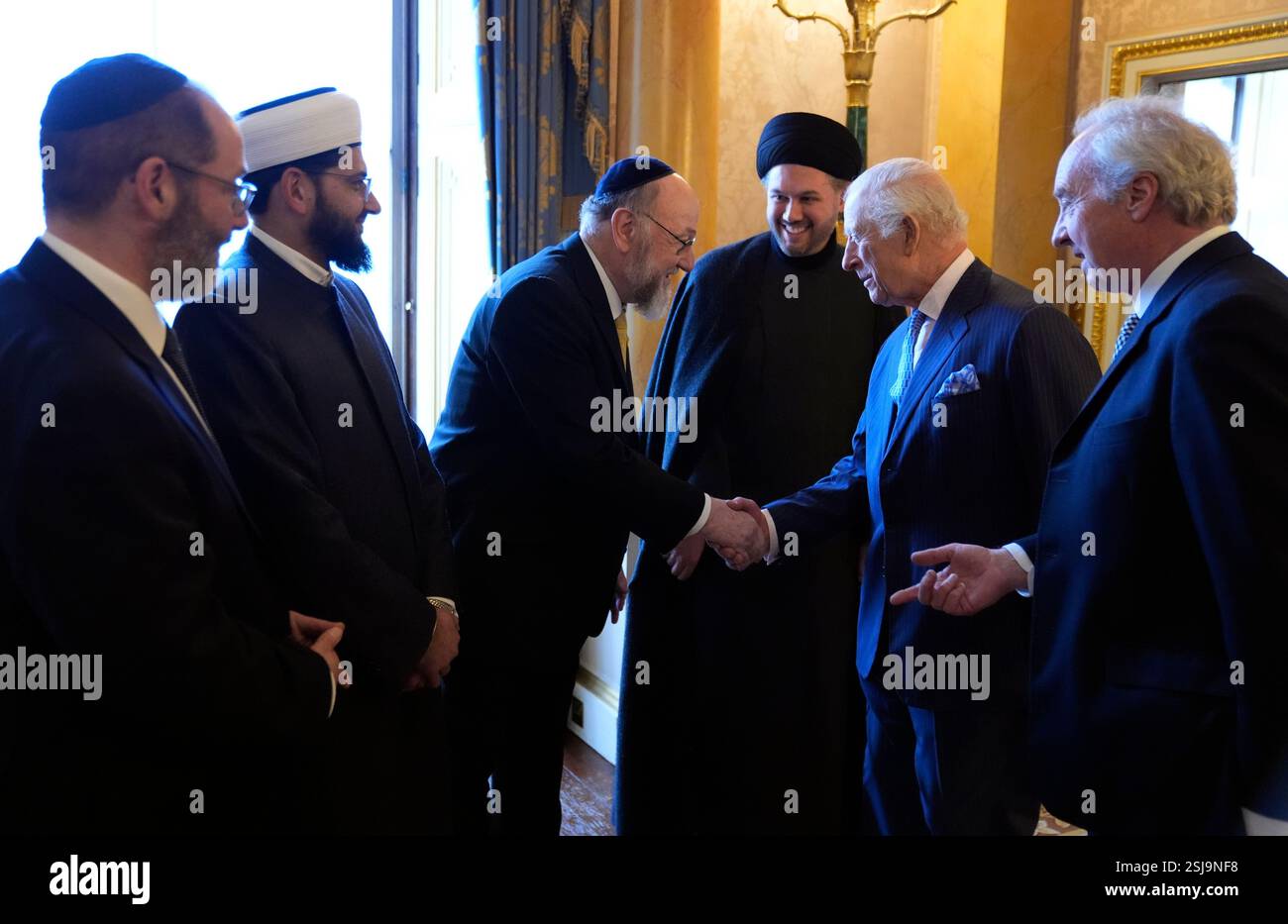 Britain's King Charles III, second right, meets with Chief Imam Dr ...