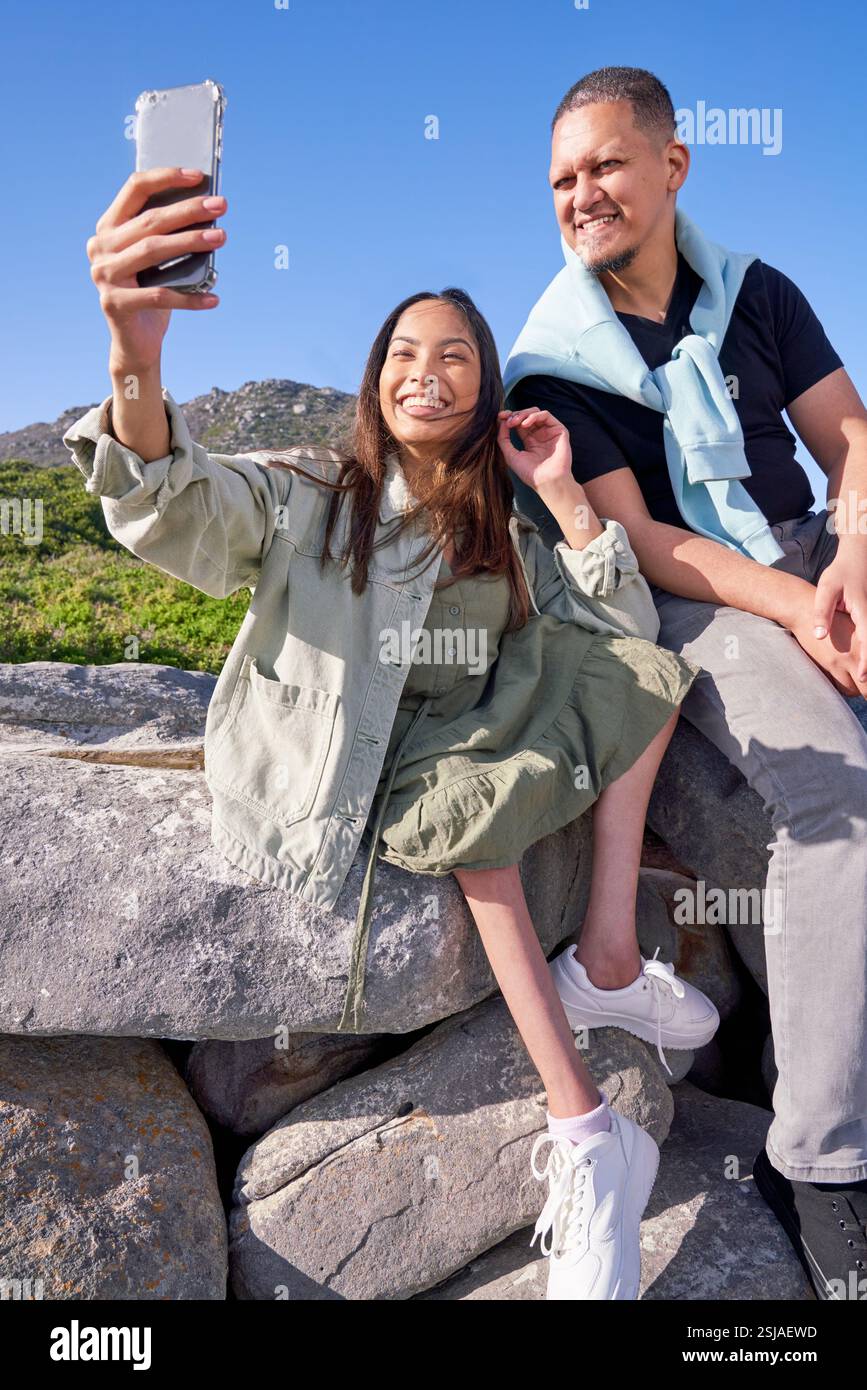 Man and disabled woman taking selfie in landscape Stock Photo - Alamy