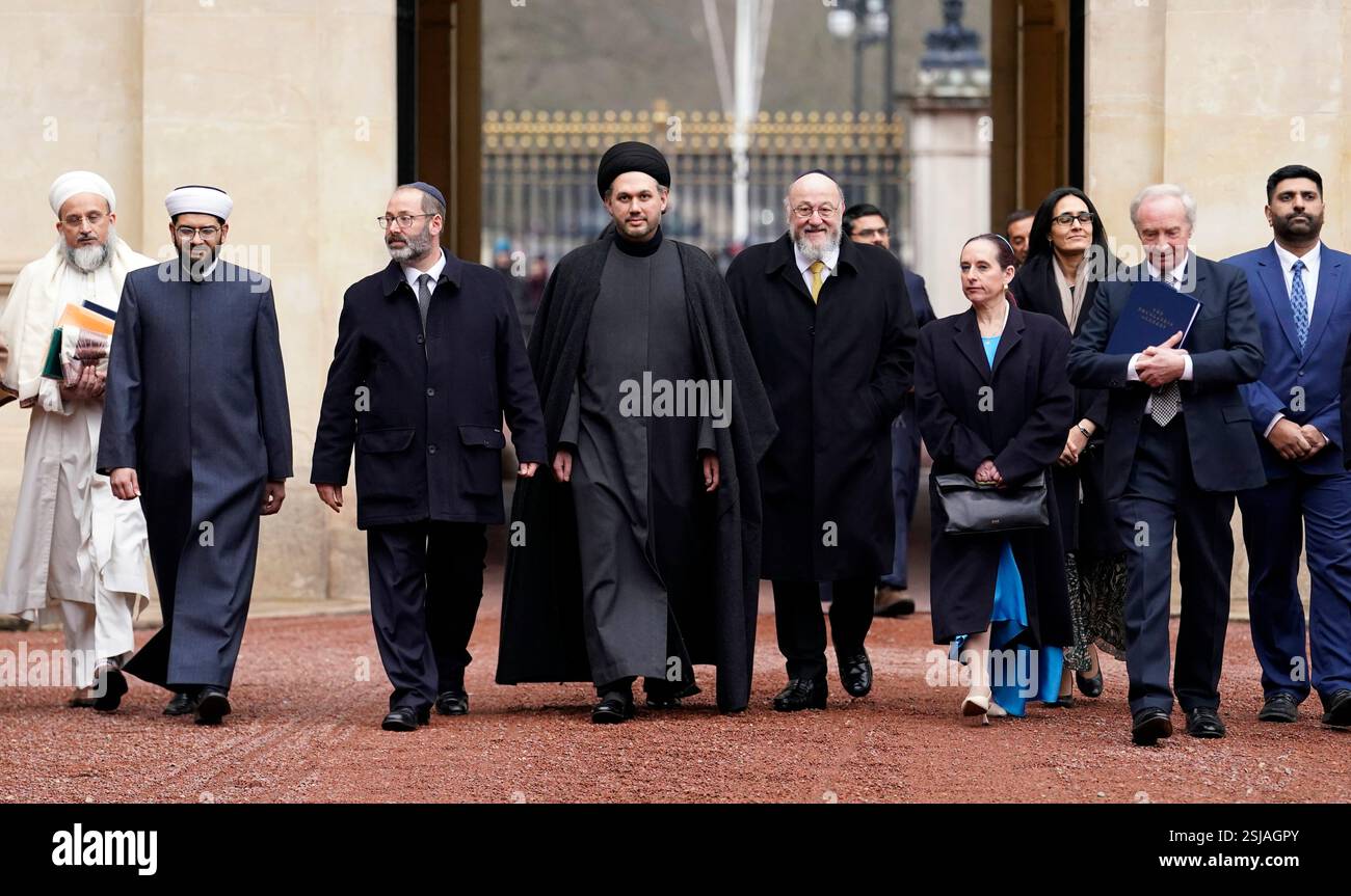 Chief Rabbi Sir Ephraim Mirvis (centre right) and Chief Imam Dr Sayed ...