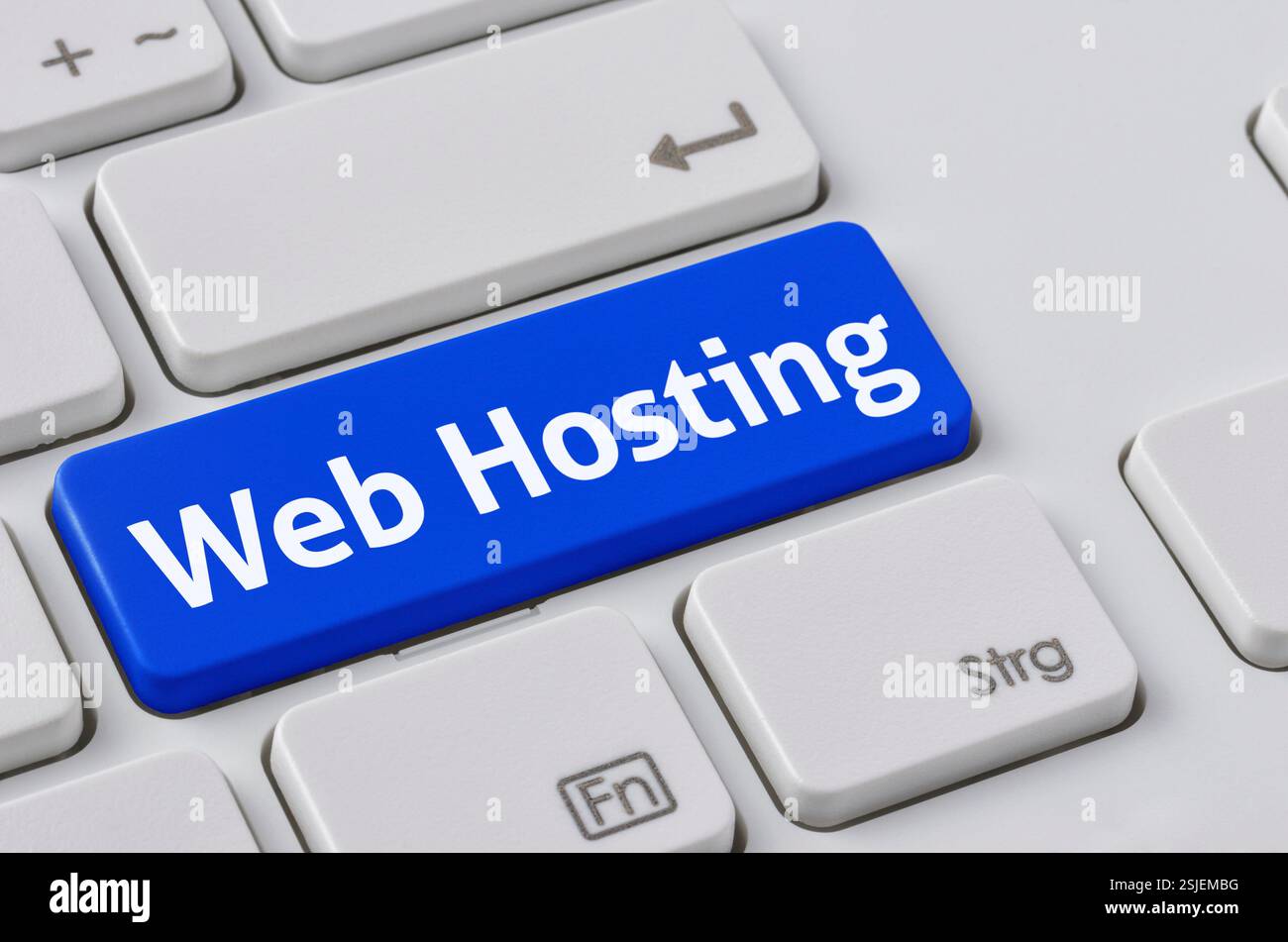 Keyboard with colored key - Web Hosting Stock Photo