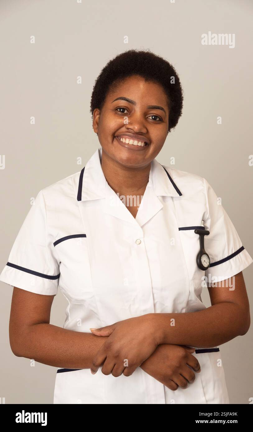England United Kingdom, 03.02.2025. Nurse in white coat with a watch and pen in pocket. Stock Photo