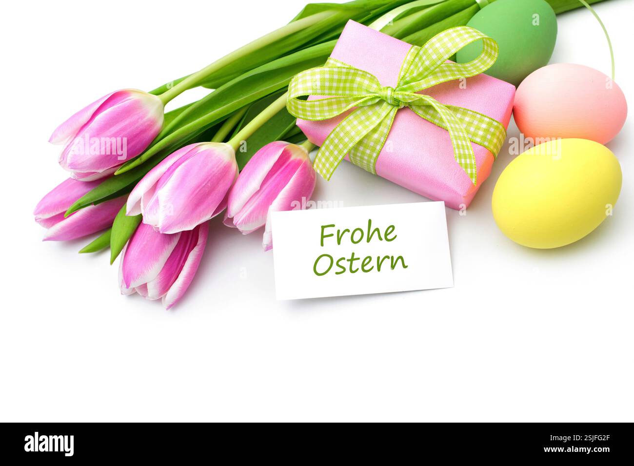 Tulips with tag and german text for Easter Stock Photo