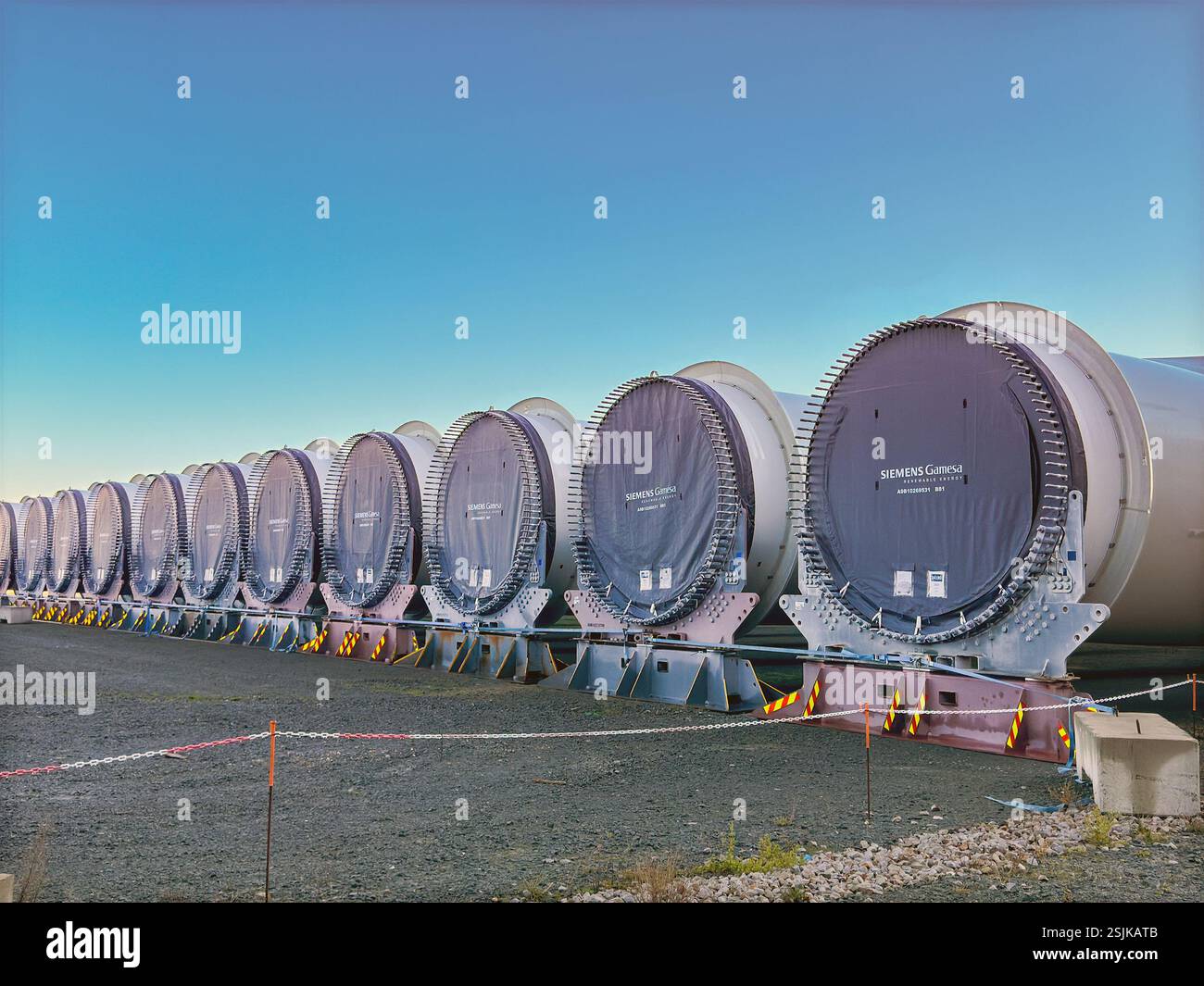 Le Havre, France, Europe - 16 January 2025: Ends of large wind turbine blades made by Siemens stored on the dockside in the Port of Le Havre. - Smartphone Captured Stock Image