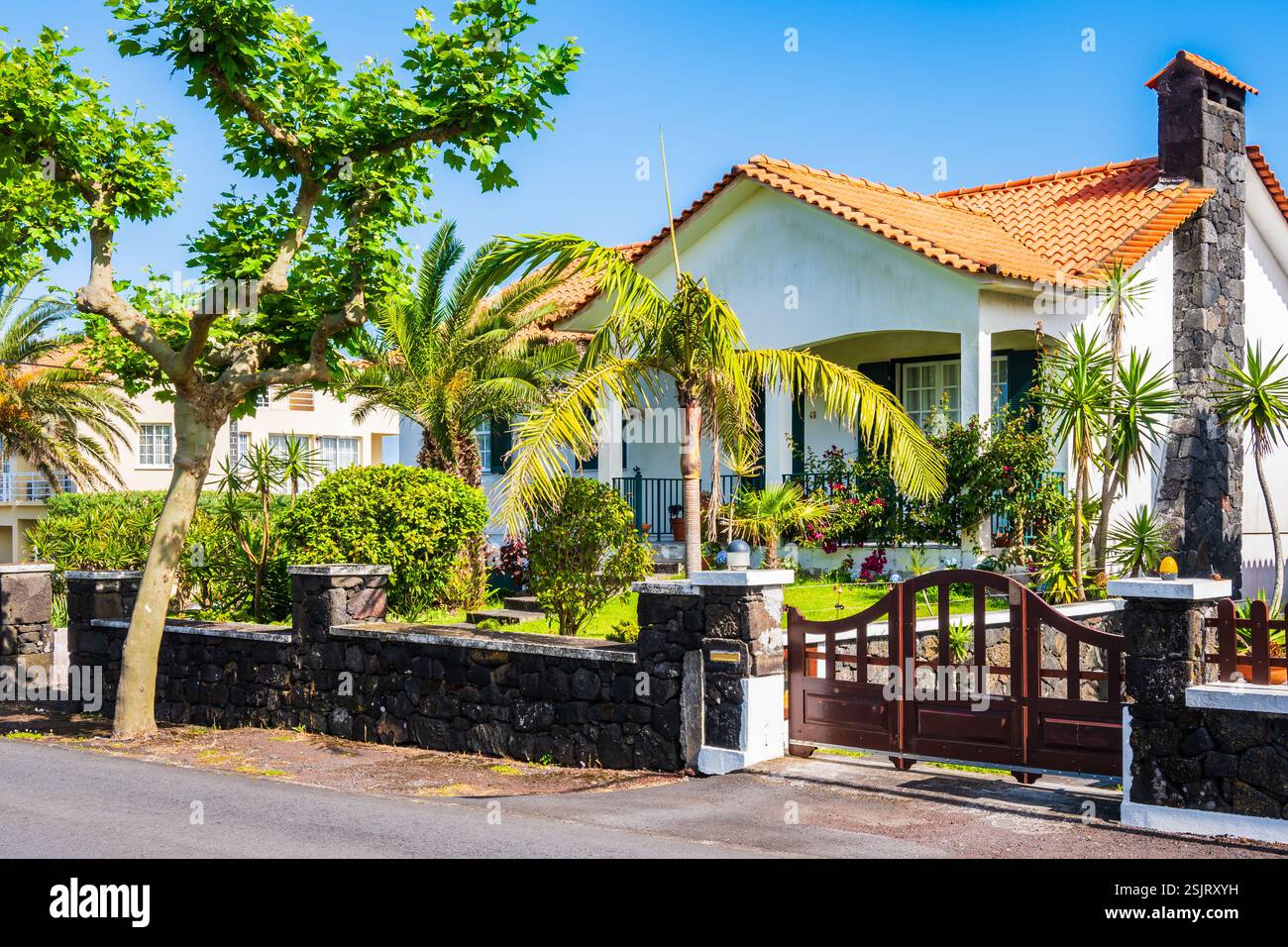 Typical house with garden built in traditional colonial style in ...