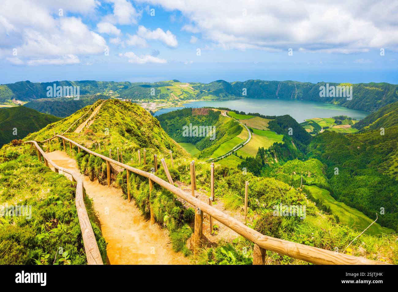 View Of Sete Cidades Crater Lakes In Green Mountain Landscape During view-of-sete-cidades-crater-lakes-in-green-mountain-landscape-during