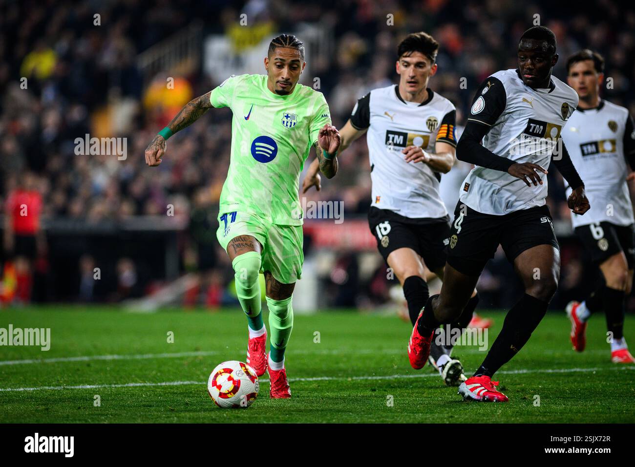 FC Barcelona's Brazilian player Raphinha in action during a Copa del Rey match at Mestalla, Valencia Stock Photo