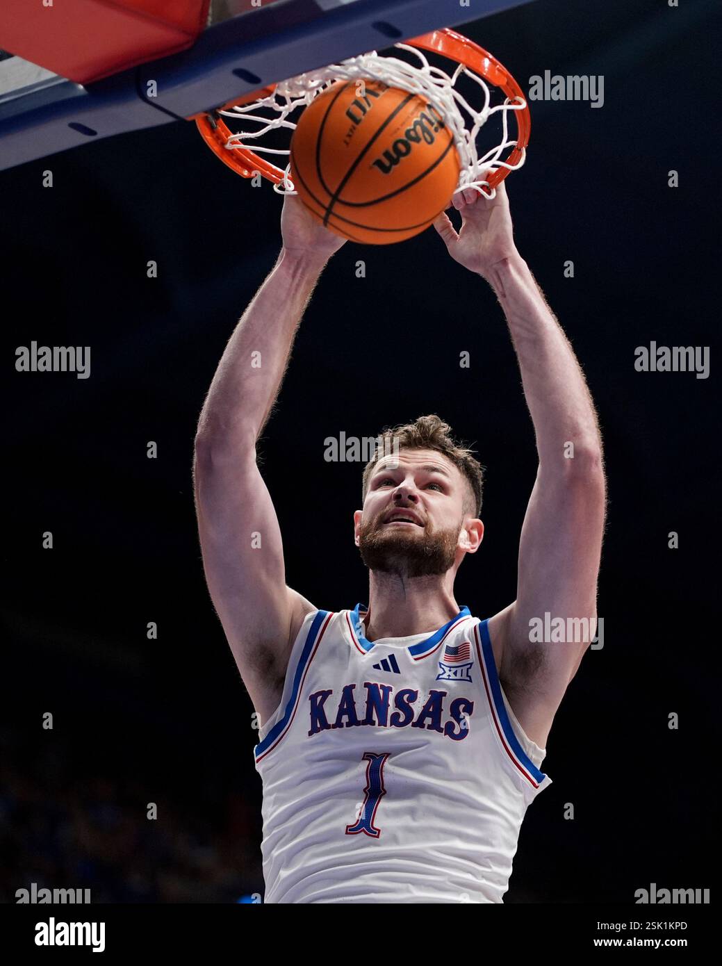 Kansas Dunks Kansas center Hunter Dickinson dunks the ball during the first half of ...