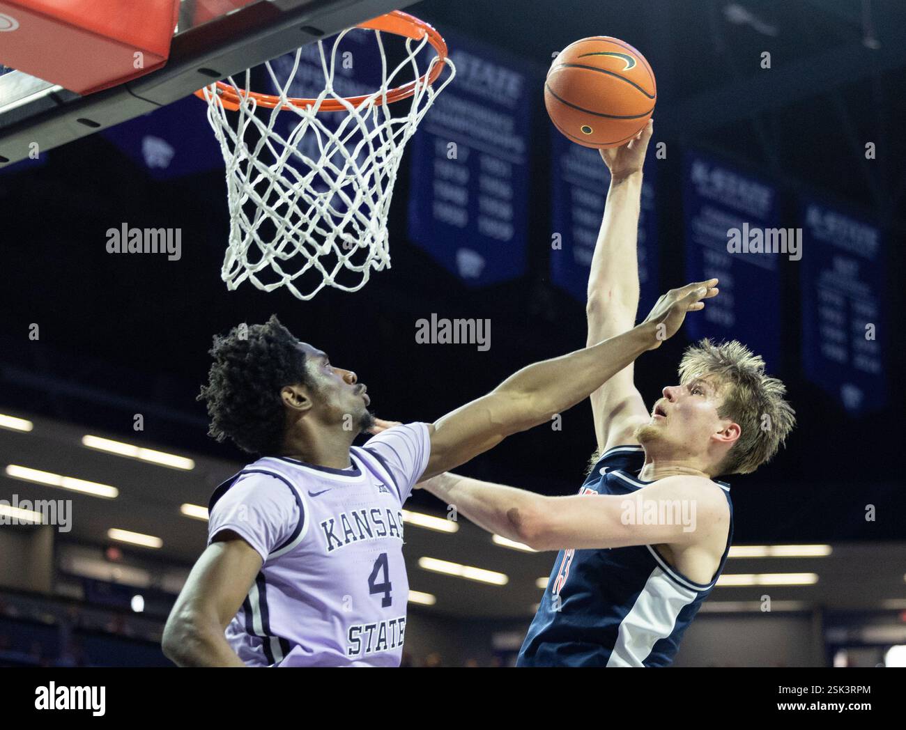 Arizona's Henri Veesaar, right, shoots against Kansas State's Mobi