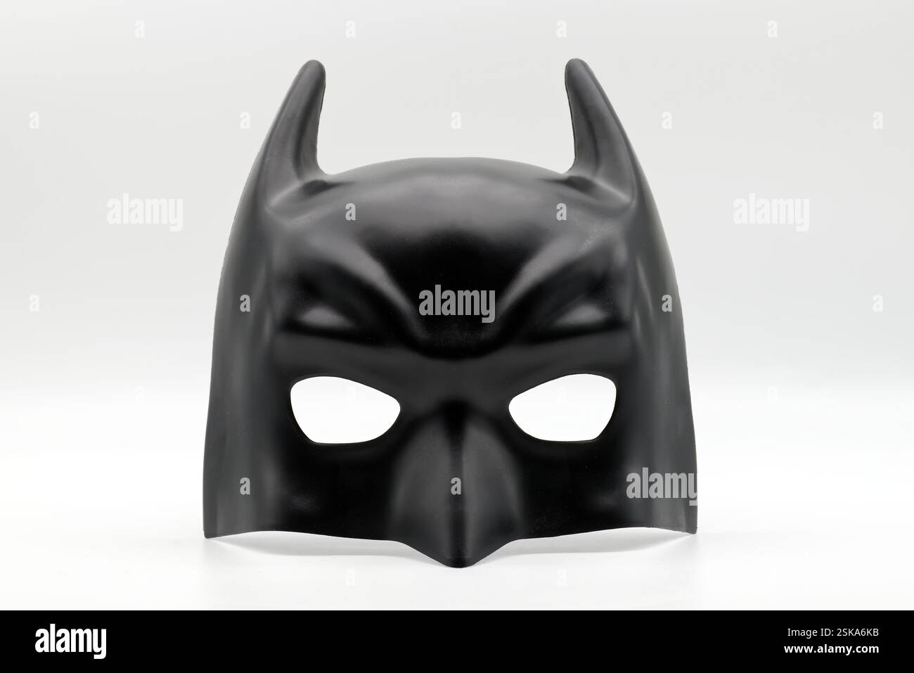 Bologna - Italy - February 10, 2025: The Batman mask by Ciao Srl isolated on white background. Stock Photo