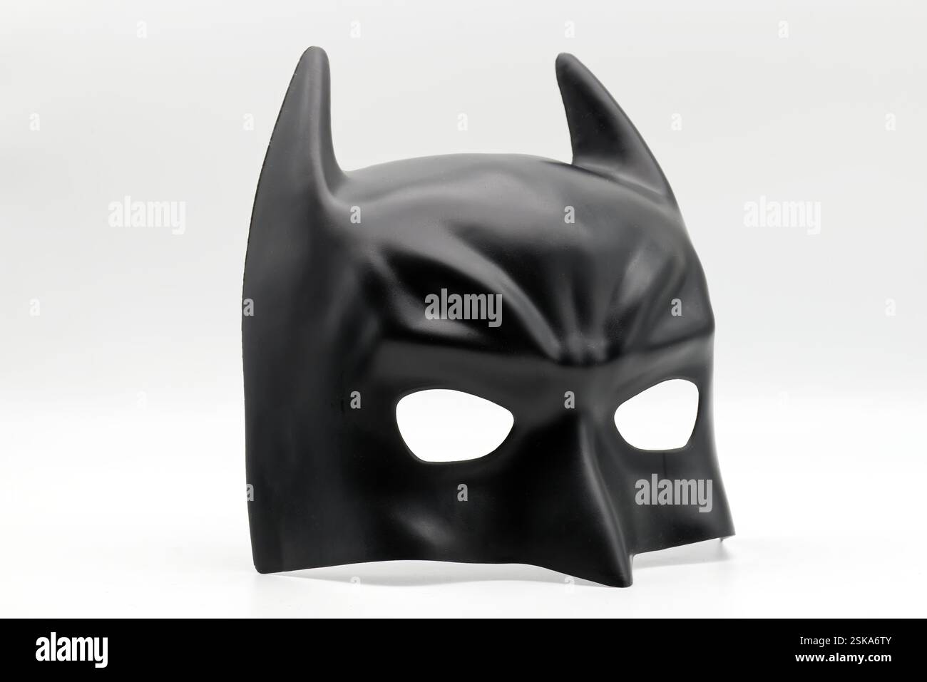Bologna - Italy - February 10, 2025: The Batman mask by Ciao Srl isolated on white Stock Photo