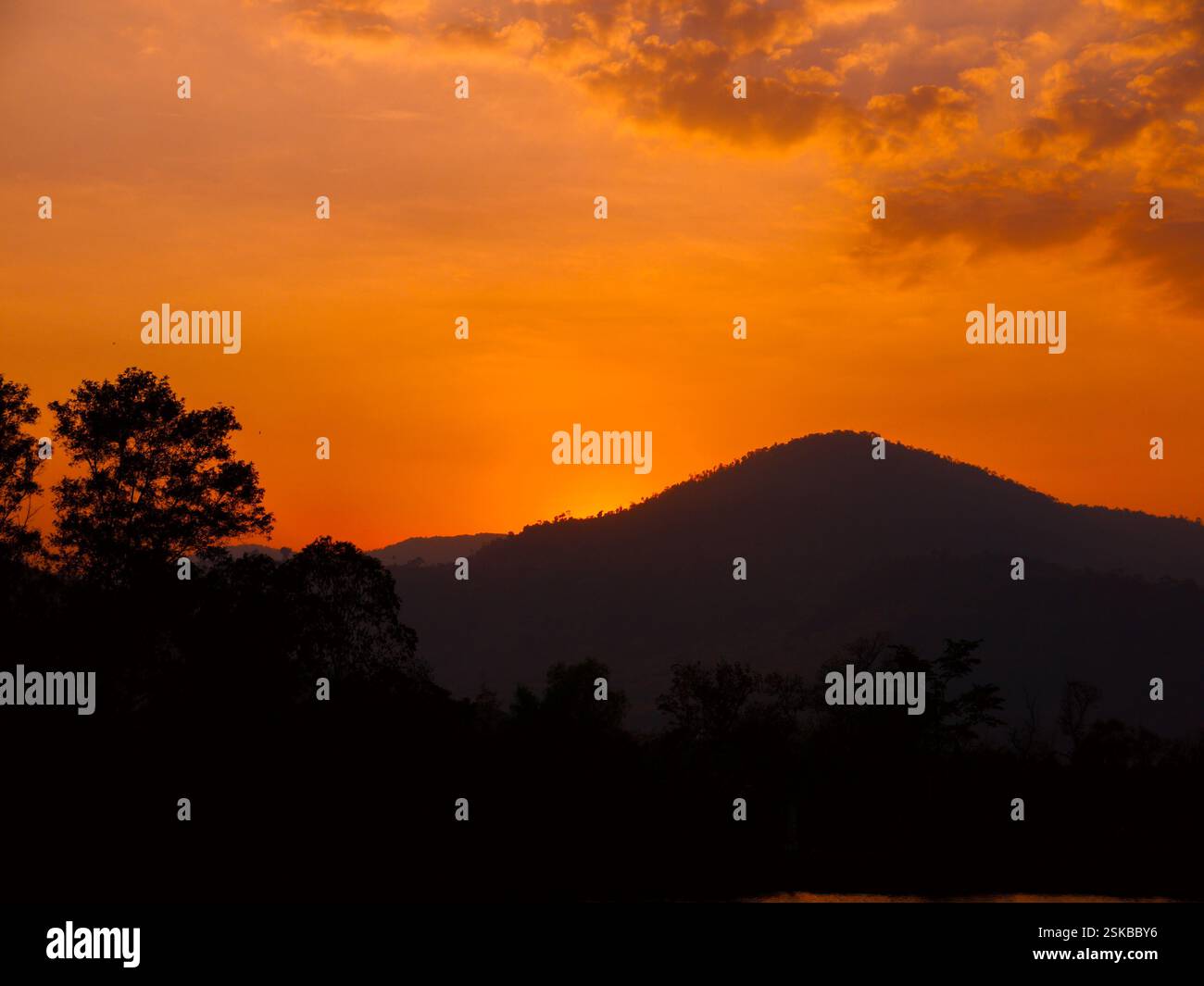 beautiful view of mountain and sunset with the sea Stock Photo - Alamy