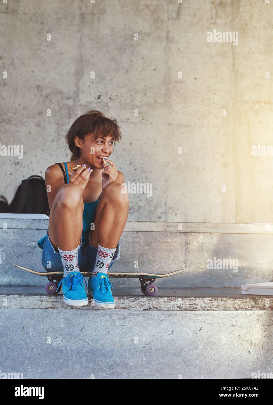 Teen athlete eating hi-res stock photography and images - Alamy