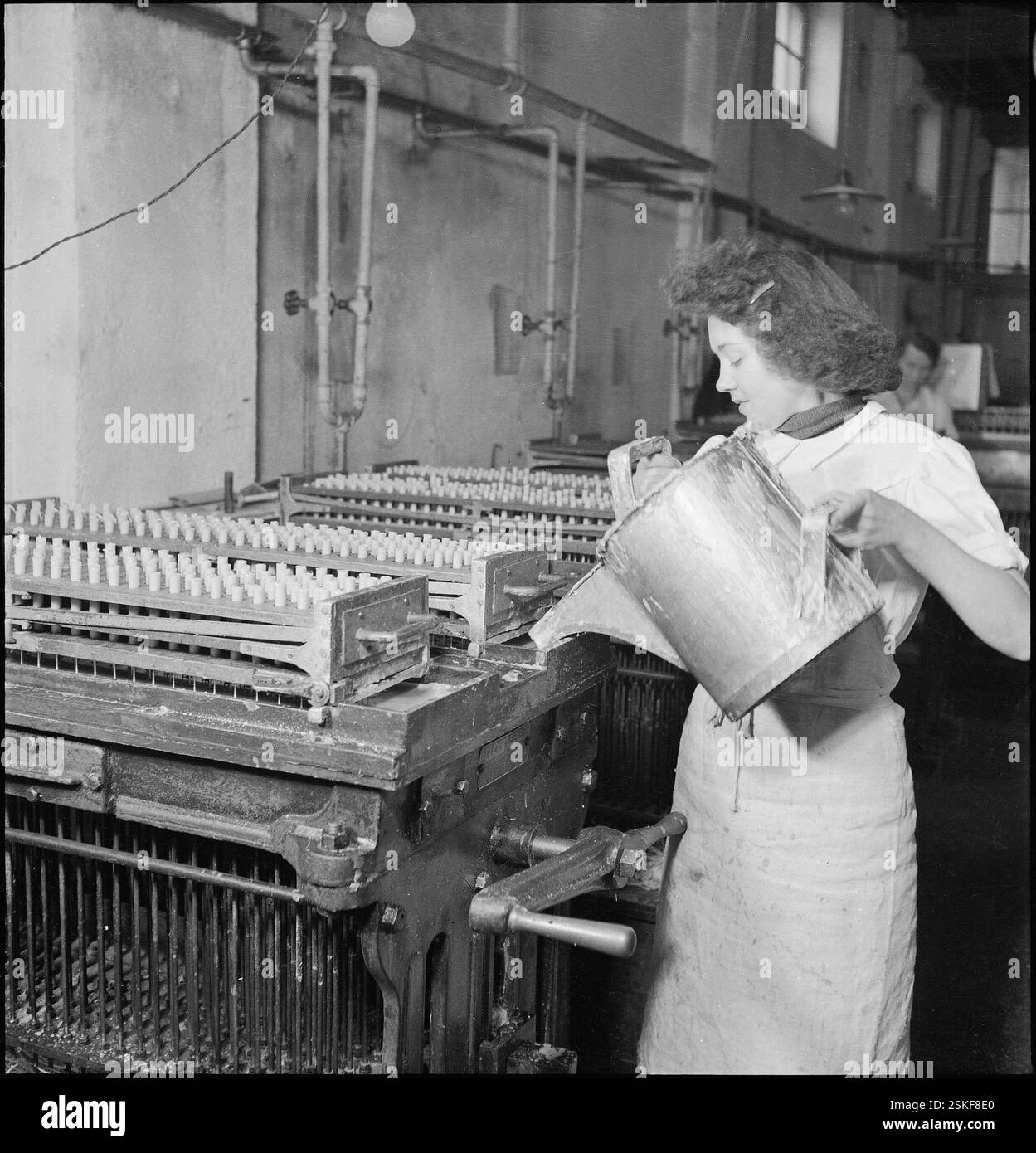 --- Fabrikation von Kerzen, Genf 1944#Fabrikation von Kerzen, Geneva 1944- RDB BY DUKAS Stock Photo