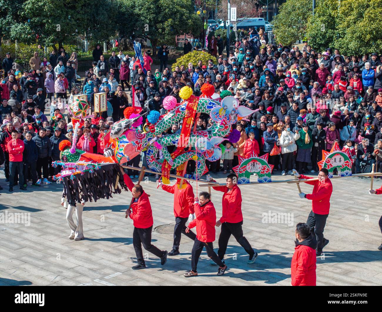 Bench dragons wind theirs ways through a village to celebrate the
