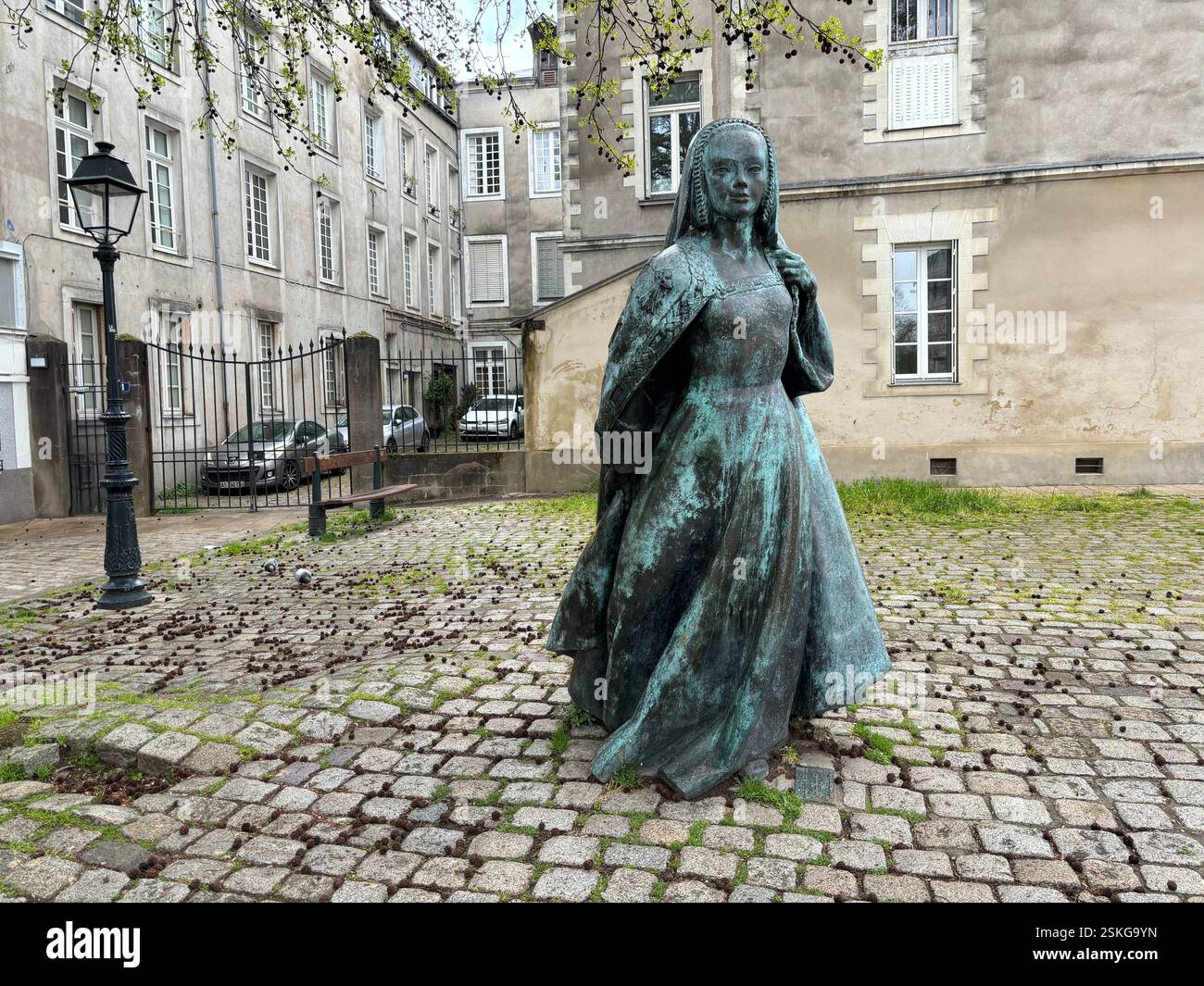 Statue of Anne de Bretagne on the street outside the Château des ducs de Bretagne in Nantes, France - Smartphone Captured Stock Image