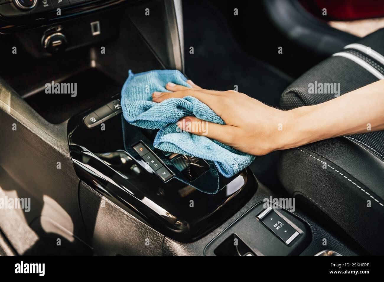 Cleaning and detailing car interior using microfiber towel Stock Photo