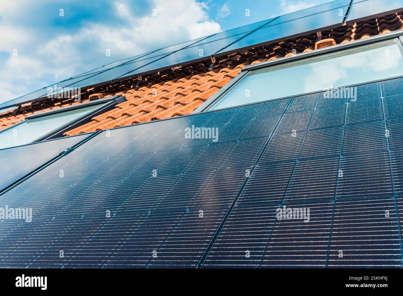 Photovoltaic panels on the roof of family house, solar panels ...