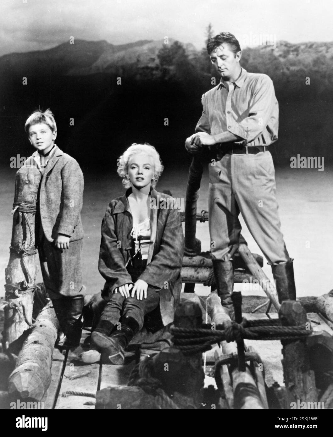 Tommy Rettig, Marilyn Monroe, Robert Mitchum in