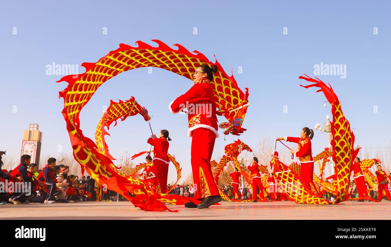 BAZHOU, CHINA FEBRUARY 12, 2025 Artists perform a folk Shehuo to