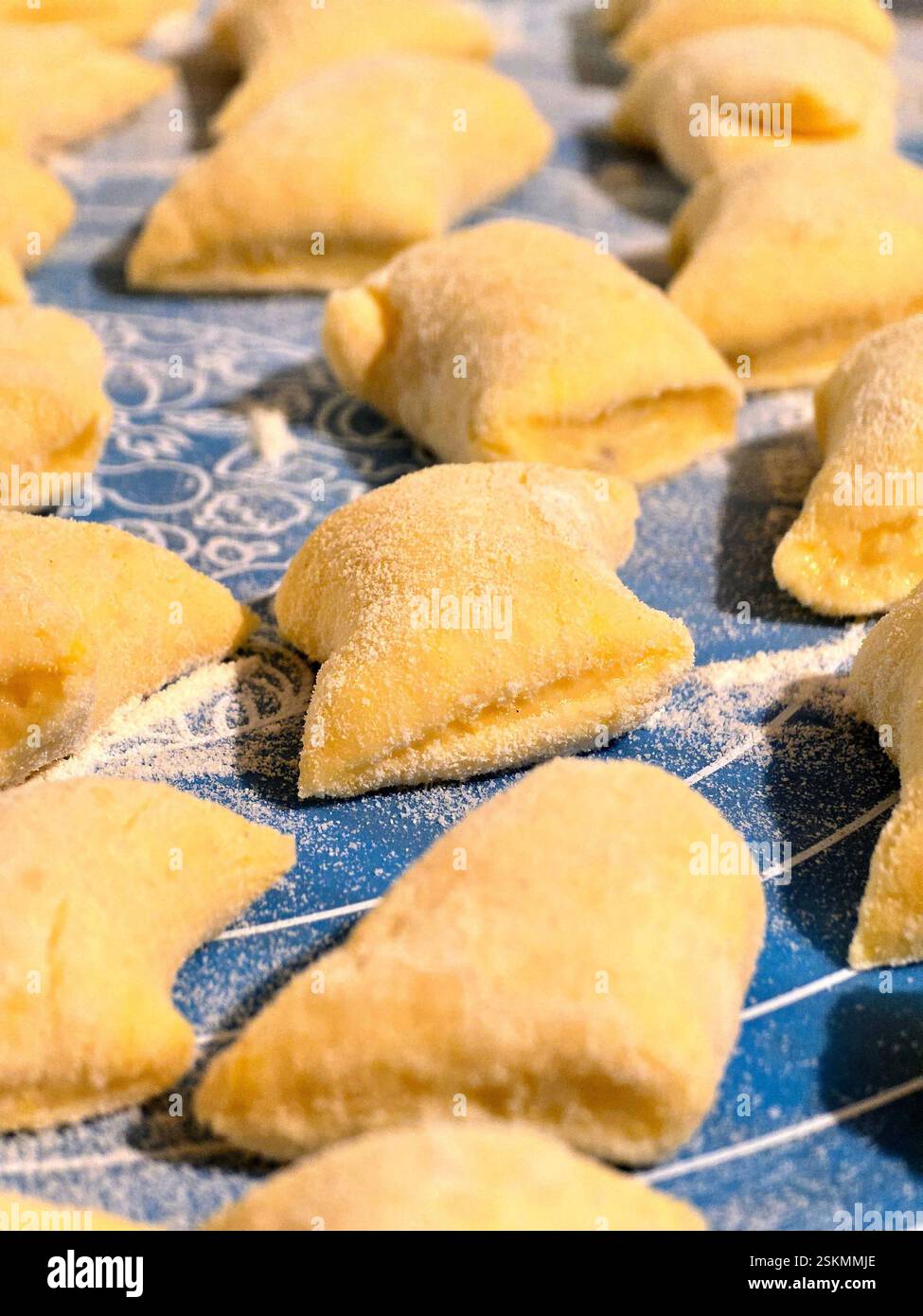 The photo shows dumplings made from boiled potatoes, eggs and flour. A traditional Polish dish. - Smartphone Captured Stock Image