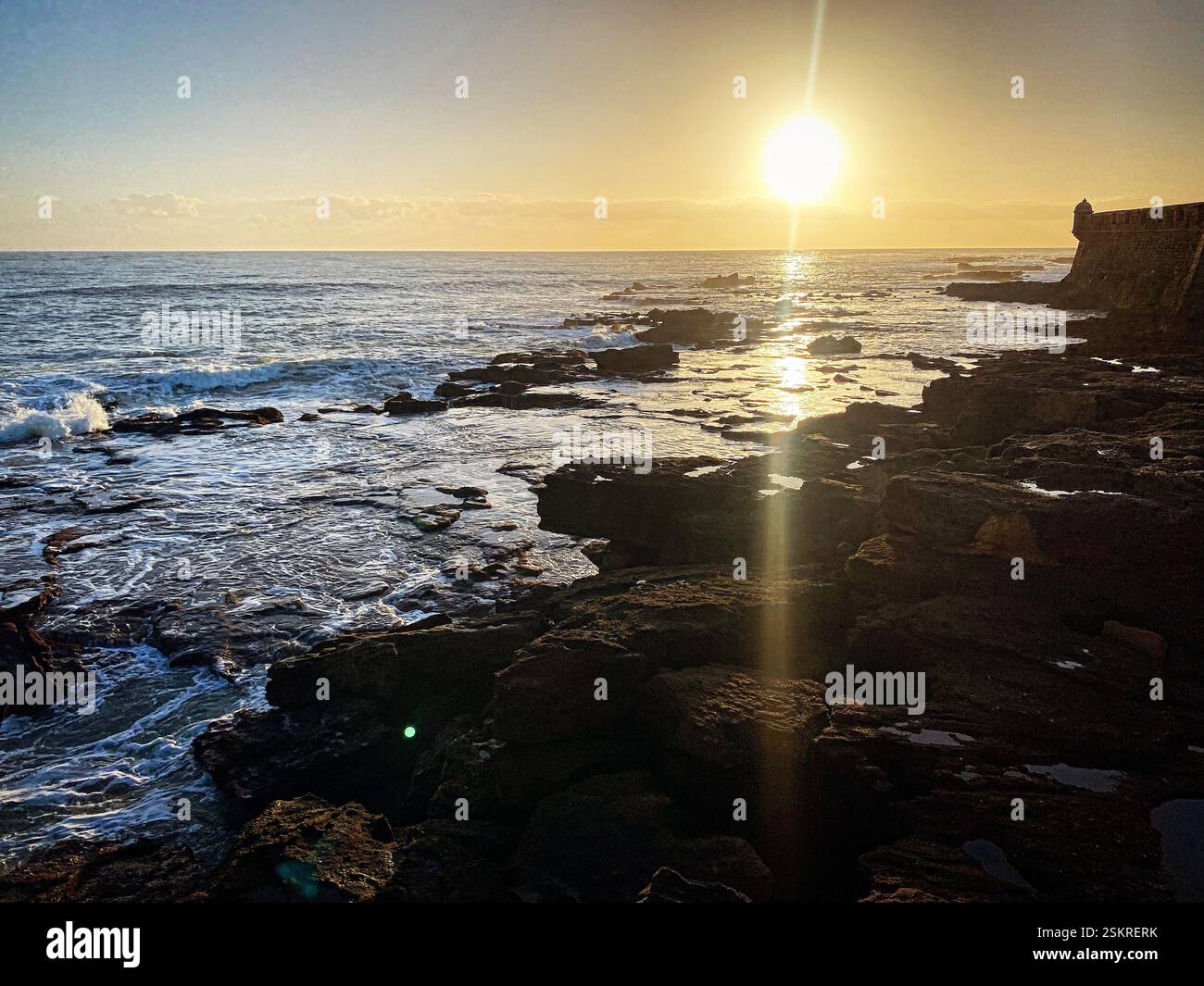 Sunset in San Sebastian fortress in La Caleta beach in Cadiz, Andalucia, Spain. - Smartphone Captured Stock Image