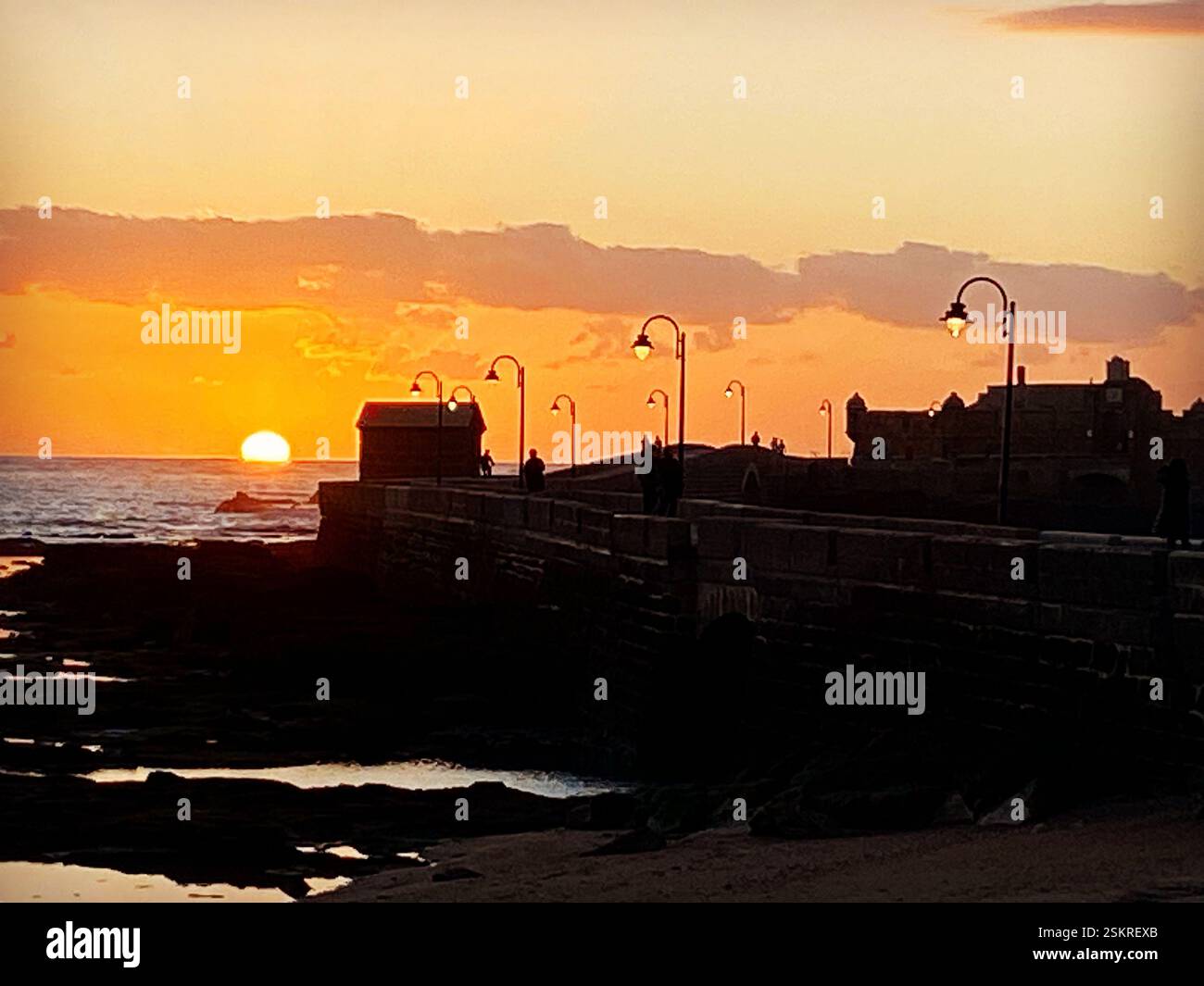 Sunset in San Sebastian fortress in La Caleta beach in Cadiz, Andalucia, Spain. - Smartphone Captured Stock Image