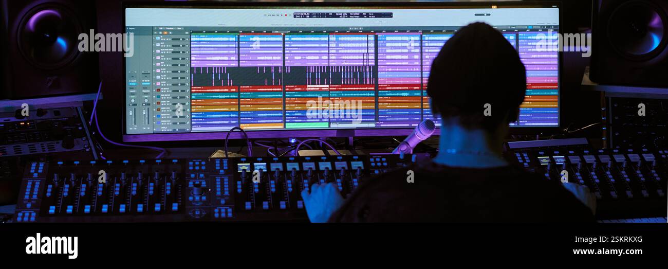 Audio Engineering Backround Back view male engineer sound hi-res stock photography and images - Alamy