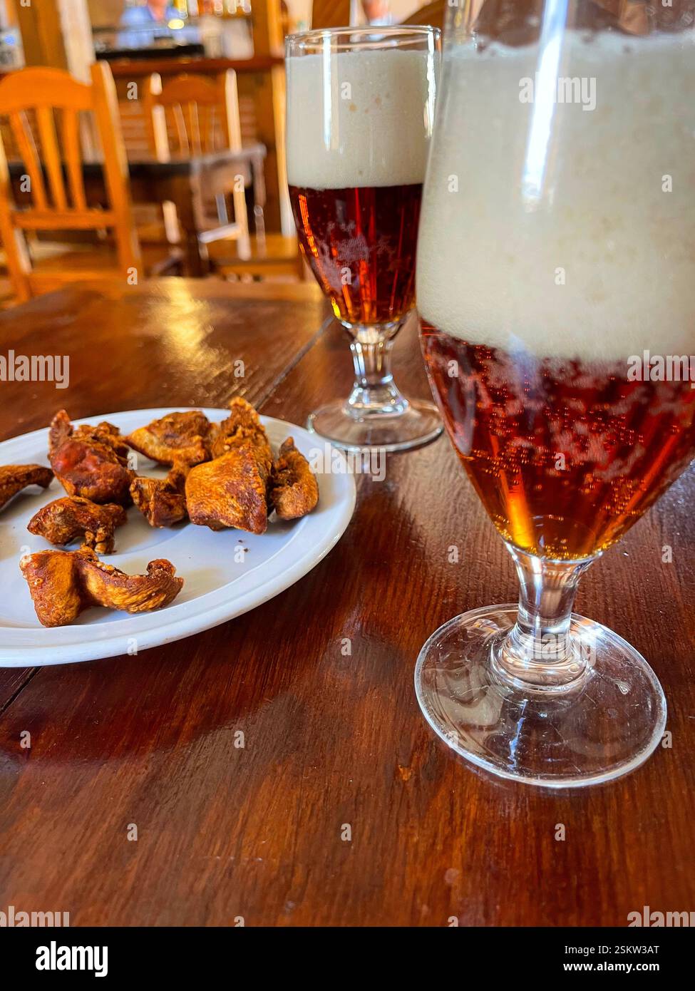 Two glasses of beer with tapa. Spain. - Smartphone Captured Stock Image