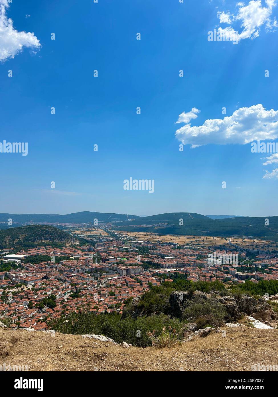Beautiful high angle view of a Turkish city surrounded by mountains - Smartphone Captured Stock Image