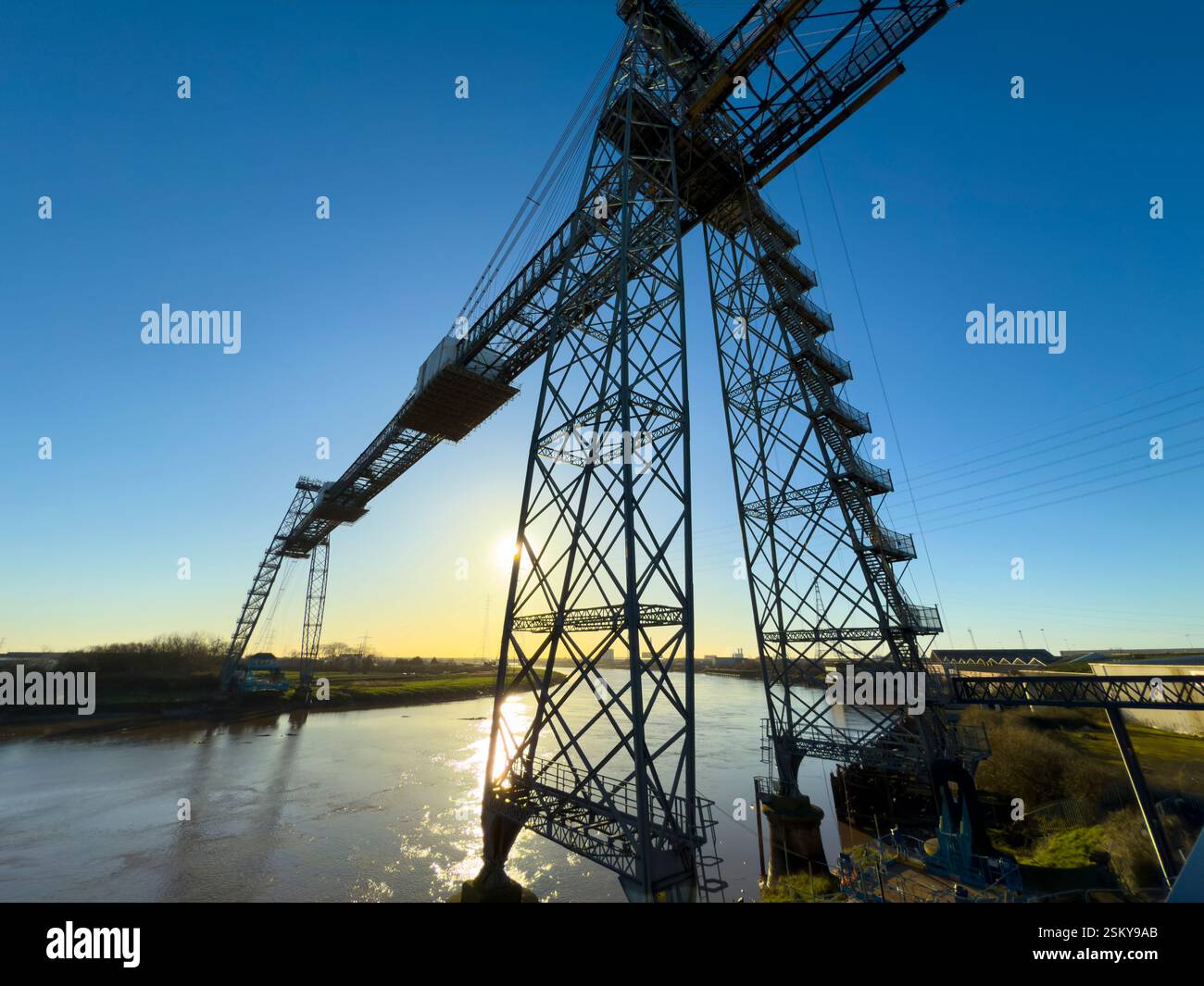 The Newport Transporter Bridge, an iconic feat of early 20th-century engineering, spans the River Usk in South Wales: Phillip Roberts - Smartphone Captured Stock Image