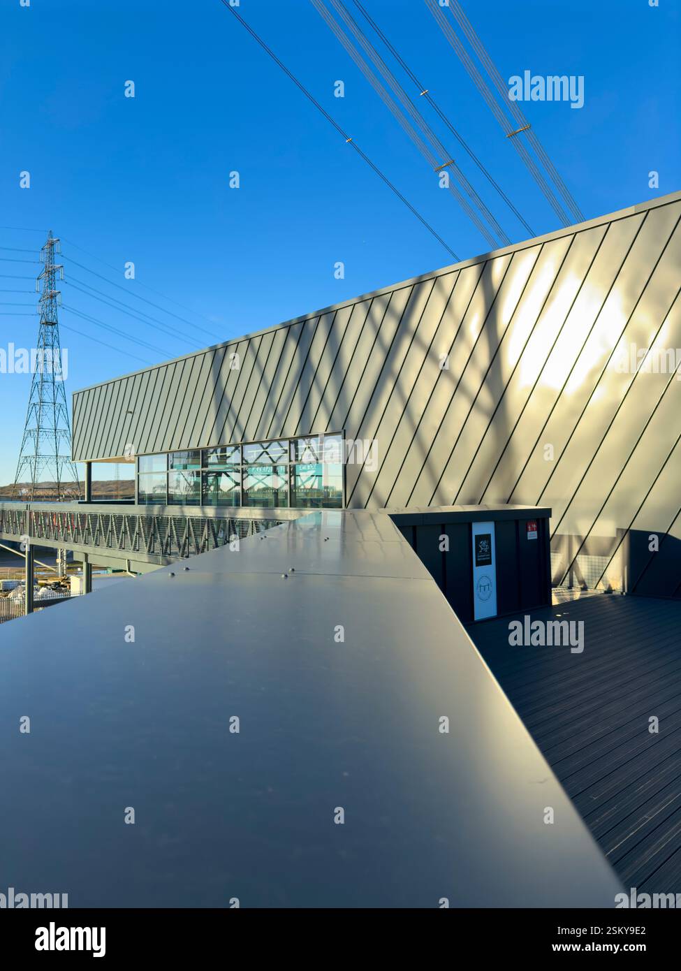 The Newport Transporter Bridge, an iconic feat of early 20th-century engineering, spans the River Usk in South Wales: Phillip Roberts - Smartphone Captured Stock Image