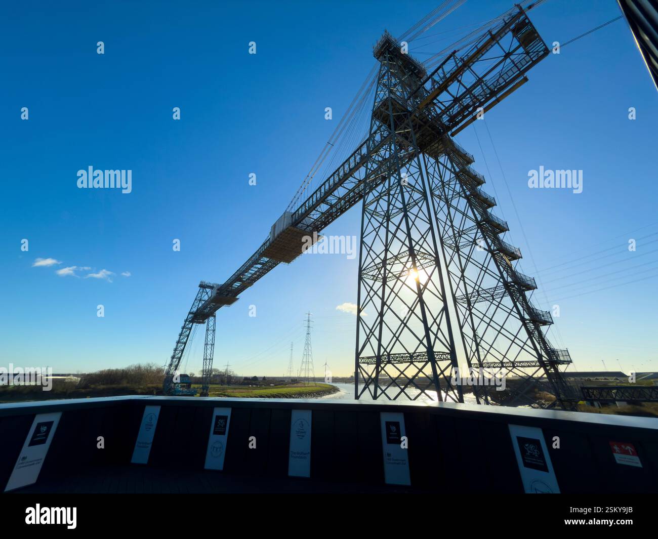 The Newport Transporter Bridge, an iconic feat of early 20th-century engineering, spans the River Usk in South Wales: Phillip Roberts - Smartphone Captured Stock Image