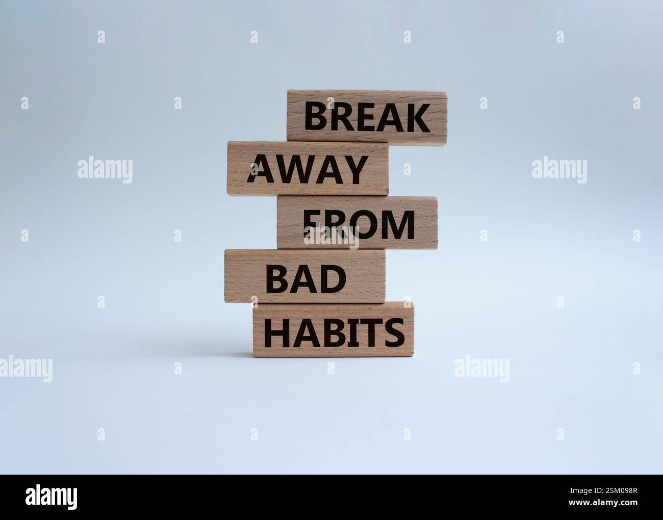 Break away from bad habits symbol. Wooden blocks with words Break away ...