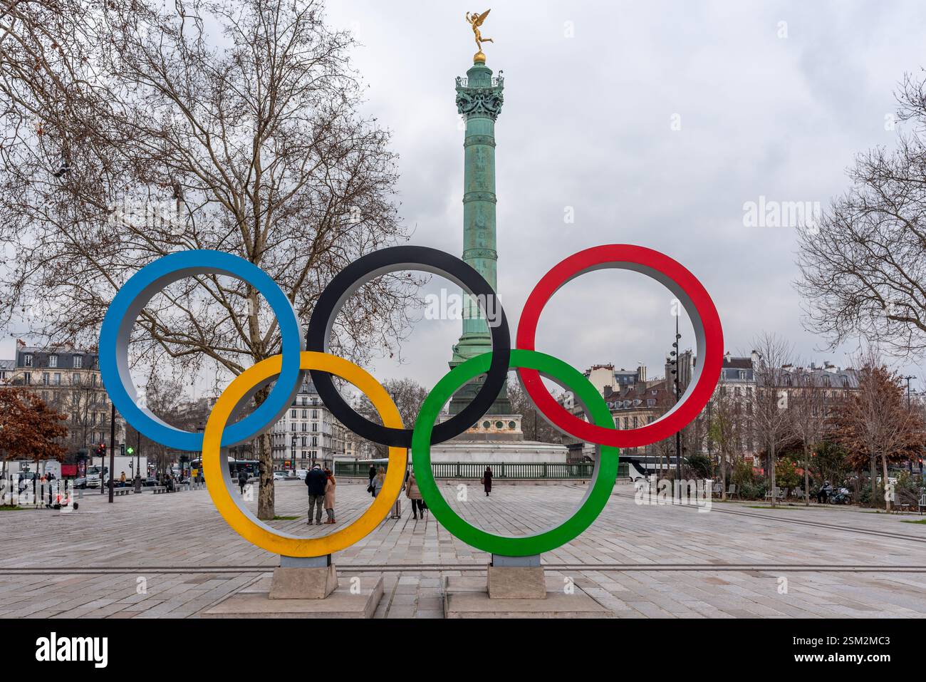 The Olympic rings on Place de la Bastille with in the background the ...